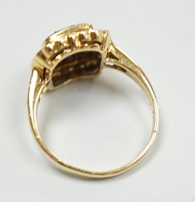 A modern 18ct gold, sapphire and diamond set cluster ring, size M, gross weight 4.7 grams.